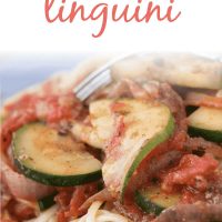 Linguini in a tomato sauce with sliced zucchini and text Zucchini Linguini