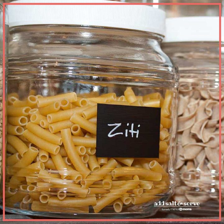 Glass jar filled with ziti with a chalkboard paint label and ziti written in chalk paint