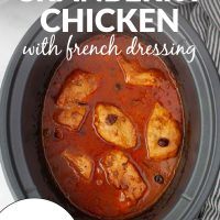 Slow cooker with six pieces of boneless skinless chicken breast that have been cooked in a sauce of French dressing, whole berry cranberry sauce, and onion soup mix with text Slow Cooker Cranberry Chicken with French dressing - Just 4 ingredients.