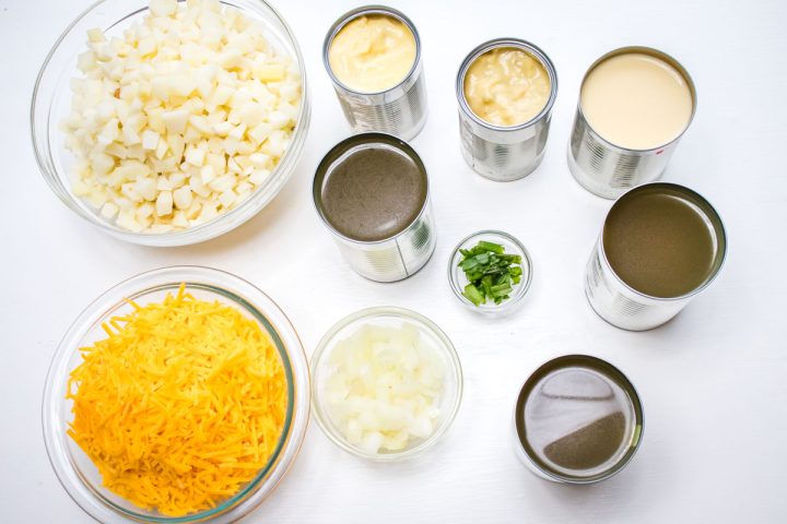 Ingredients for Potato Soup with Hash Browns: hash browns, cheddar cheese, cream soups, evaporated milk, chicken broth, chopped onion, and green onion.