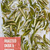 Roasted okra and onion slices on a sheet pan lined with parchment paper with text Roasted Okra & Onions